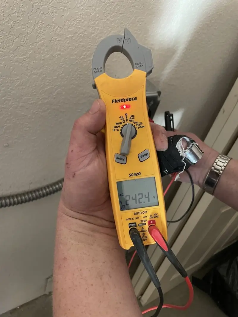 Voltage testing with clamp meter during Hot Tub / Pool Electrical Wiring in German Flatts